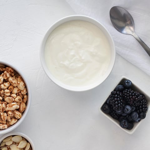 top-view-yogurt-bowl-fruits